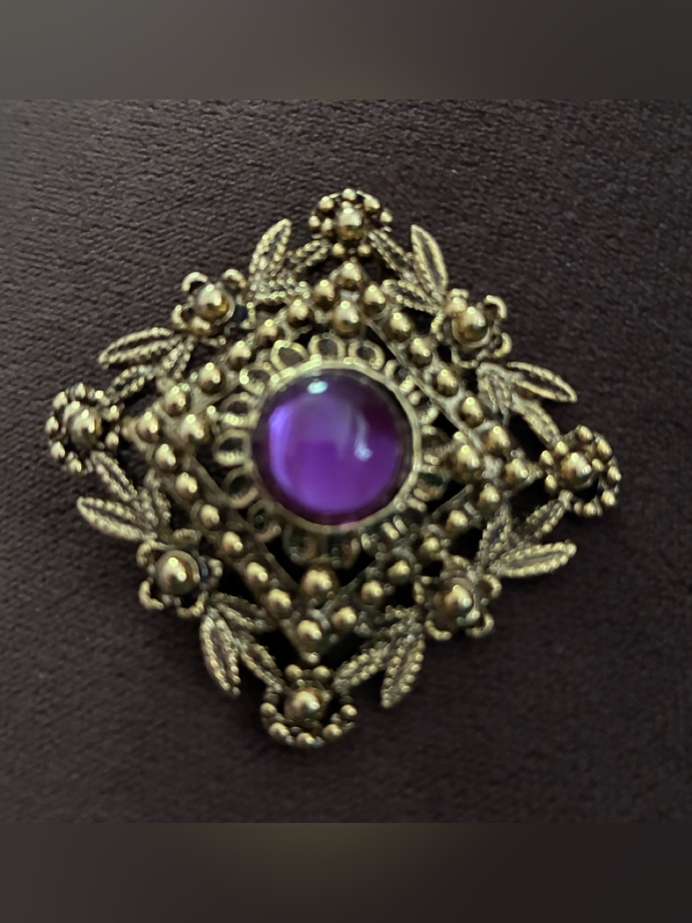 Vintage-Inspired Gold Brooch with Purple Cabochon